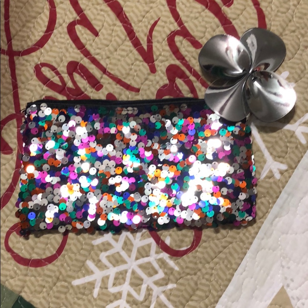 Mac sequin makeup bag can also be used as clutch